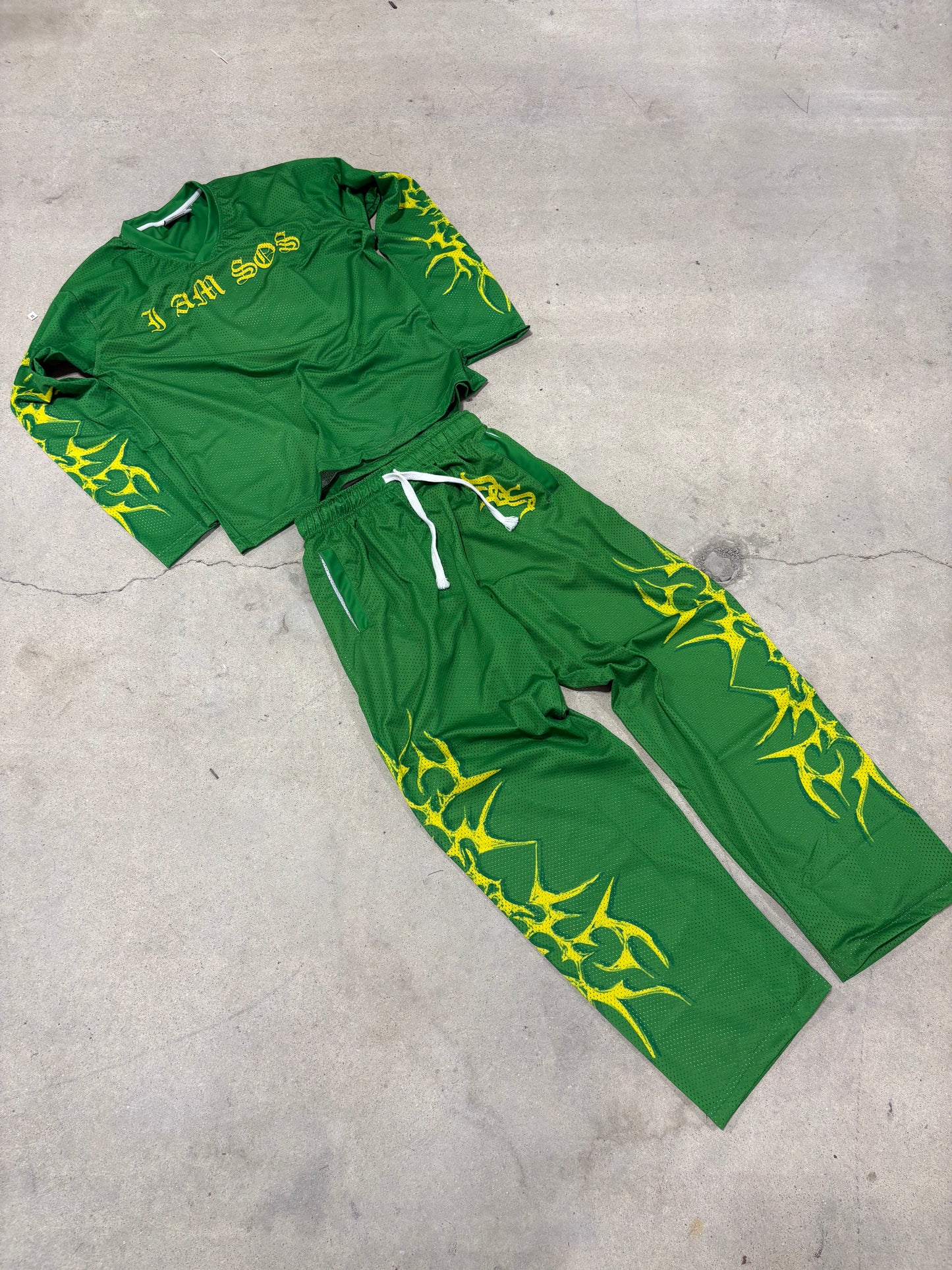 Green "I AM SOS" Mesh Pants