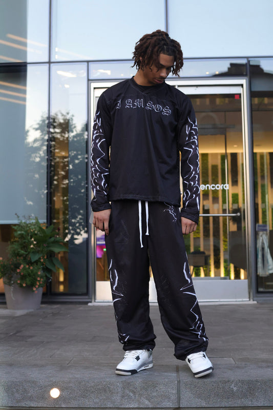 Black "I AM SOS" Mesh Pants